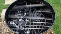 How do I control the heat on a charcoal braai